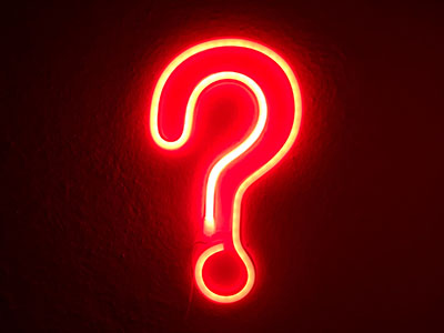 A neon light question mark