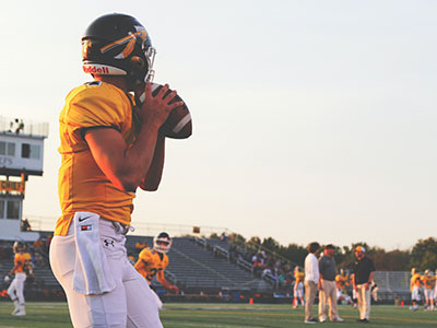 A quarterback getting ready to throw the football